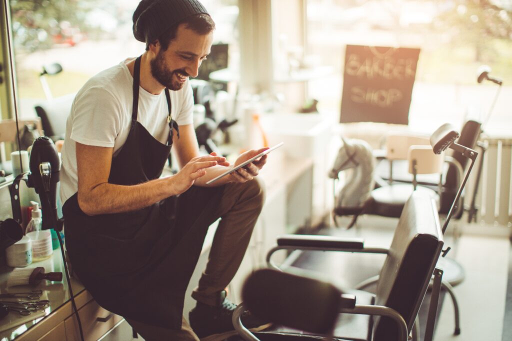 Barber promoting his business on social media