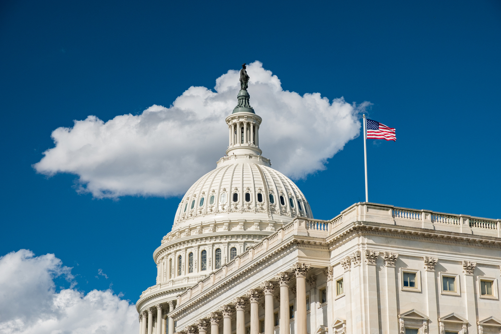 senate building with U.S. flag waving